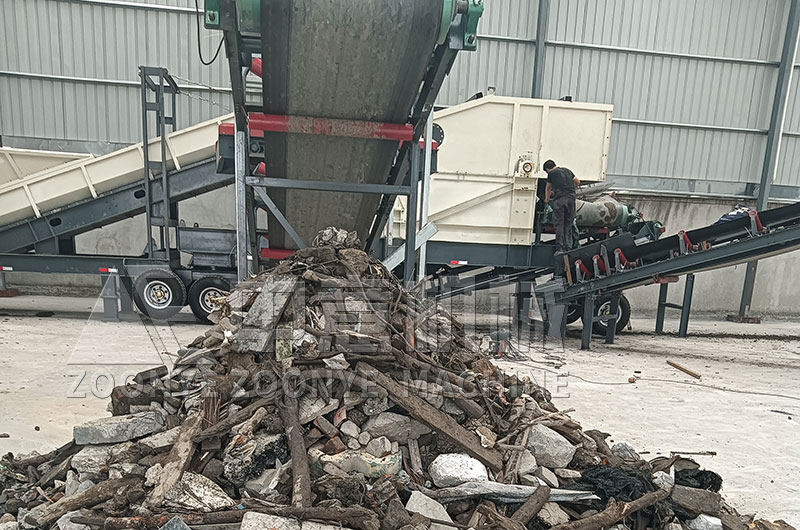 篩分木材、石塊